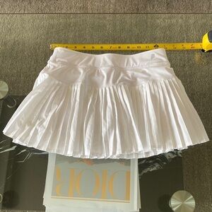 Prince white pleated tennis skirt attached shorts. Size 10-12. EUC